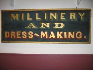Dressmaking and millinery sign