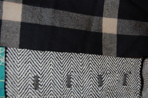 I used the "gray"portion of this windowpane check for the buttonhole "strips".