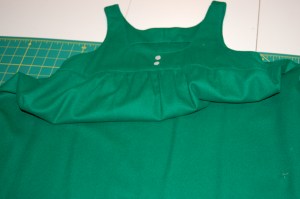 The dress with the side seams separated.