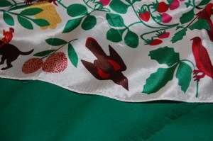 A detail of the scarf on top of the skirt.