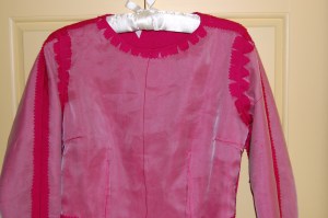 The widened neckline.