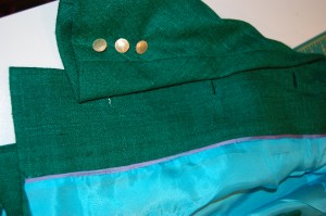 The gold buttons added to the sleeves and another view of the lining (and the back of the bound buttonholes).