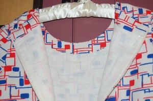 This photo shows the neck facing and the off-white lining I used for the body of the dress.