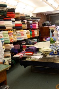 Bolts and bolts of boucles and other fabrics.