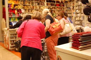 Classmates Sherry and Carol being assisted by Susan.