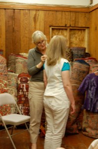 Susan making adjustments in Diane's muslin.