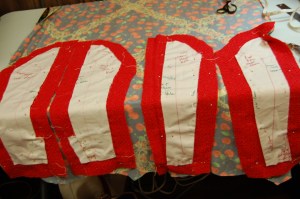 This photo shows the new pattern pieces for the top section of the sleeve. On the left, note the addition of "plackets". For a close-up, click on the photo.