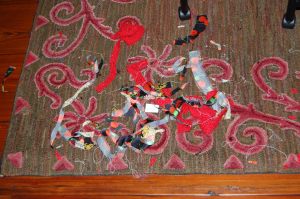 The hooked rug in my sewing room, covered with "cabbage" from my Classic French Jacket.