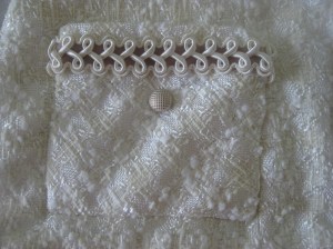 Sherry very cleverly made her pockets on the bias. The petite buttons are just right for the weave of the fabric.