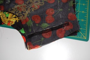 I stabilized the shoulders with a bit of selvedge from the organza underlining.