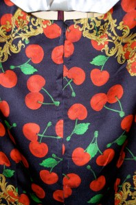 A close-up of the hand-picked zipper.