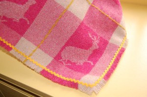 I fringed the edges of the doll blanket and added rick rack for fun!