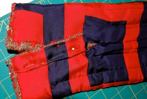 Here is the separate lining piece being applied to the placket.