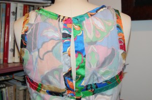 This back view also shows the extended armhole line.