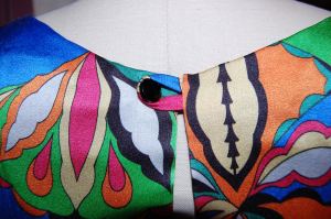 The button is one I have had in my button box for decades! Its faceted surface seemed perfect for this dress.