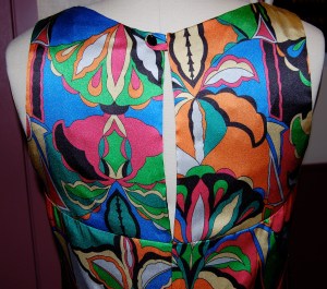 The "open" yoke on the back of the dress.