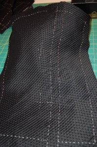 The right jacket front, marked for buttonhole placement.