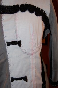 The right front of the jacket, with buttonholes sewn.