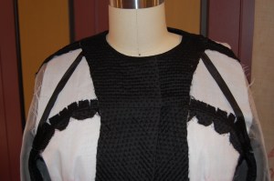 Thje front of the jacket. Note the "stays" made our of seam binding. They are loose except where they are attached at the underarm and at the collar.