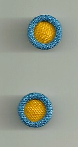I sent scraps of my fabric off to Pat Mahoney in California to have these buttons made. Sadly, Pat is retiring from her business at the end of August...