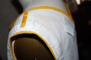 Here is the shoulder with the crepe de chine fell-stitched and understitched in place around the shouilder. Note the lingerie stay made with a folded piece of Hug Snug Rayon woven tape.