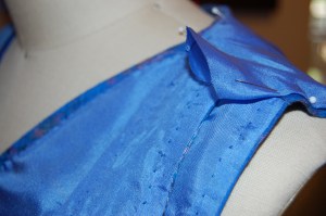 The shoulder seam encloses two finished layers in front.