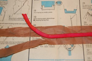  The tissue paper tears off easily and cleanly from the silk piping.