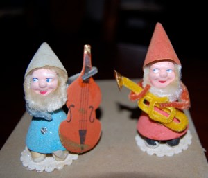 The little guy in blue doesn't look too worried about his broken instrument!