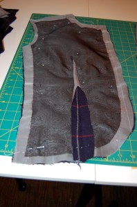 I am using black silk organza for the interfacing. This is what I did on my color-blocked coat, under Susan Khalje's tutelage, and I was delighted with the results!