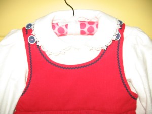 With adjustable buttons on the jumper...