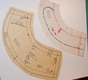 This shows not only the added curve to the collar end, but also how much width I had to remove from the collar pattern