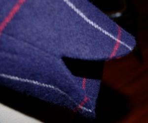 This shows the curved detail on the edge of the sleeve.