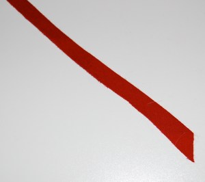 I cut a bias strip one inch in width and folded it in half. I guess this proves it pays to save scraps!?