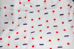 With navy blue sailor collars and red ties?