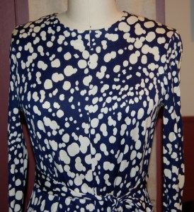 There is a center front seam to this dress which helps to make the skirt flow beautifully.