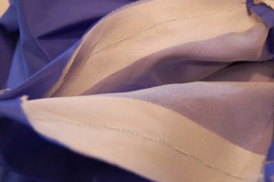 The interfacing was sandwiched between the fashion fabric and the underlining.