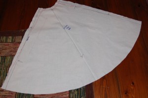 This is one of the original 4 panels. We redrew the side seams, adding enough to the waist to compensate for reducing the skirt to three panels, and by doing that, also reduced the width at the bottom of the panel.