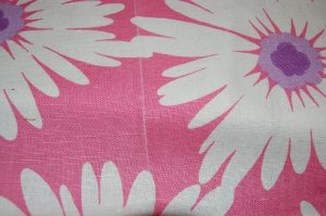 The fold line - and subsequent faint white line showing dye loss is visible in this photograph.