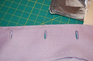 Here is the underside of the buttonholes before I finished the edges.