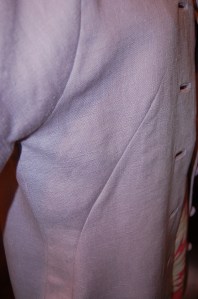 This shows the side darts which shape the coat and the dart/seam at the front of the kimono sleeve.