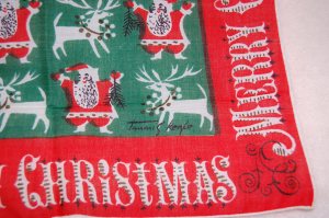 A close-up of the designer's famous signature.