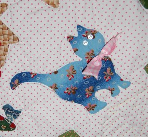 One of our cats wears a pink collar - thus the pink gingham ribbon for this cat. I added her smile after I had taken this photo.