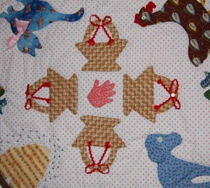 I added the red rick rack bows, secured by vintage buttons, because i thought the center of the quilt needed more "heft" - and I was pleased with the effect this small addition made. (I took this photo before I had trimmed the ends of the rick rack even.)