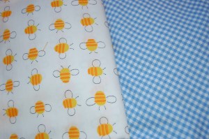The buzzy bee fabric is a vintage cotton. The blue gingham is new.