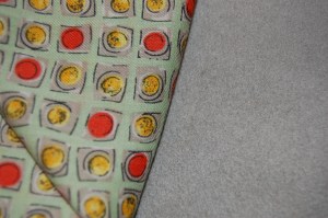 The gray in each little square is a perfect match to the cashmere.