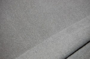 The top part of the photo shows the right side of the fabric. It has a soft, luscious nap to it. The contrast of the weave on the underside is hopefully discernible.