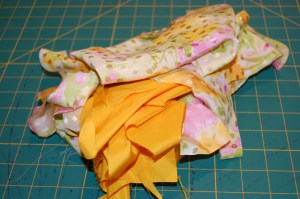 Here is a little pile left over from my recently completed dress and cocktail jacket. Not much remains - what should I do with it?