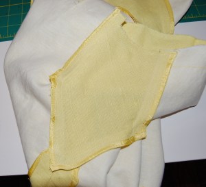 Here is an inside look. While the dress is underlined in a very light weight cotton/linen blend, I opted not to underline the gusset, in order to add to flexibility. I got this brilliant idea from Laura Mae of Lilacs and Lace sewing blog. 