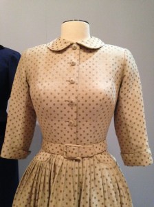 This shirtwaist dress, Norman Norell for Trina-Norell, circa 1955, had finely done bound buttonholes. the fabric is s ilk and wool brocade.