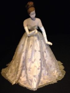 Ball gown by Lucien LeLong, with white kid gloves and pink slippers